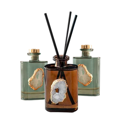 El HOGAR Amber Crystal Essential Oil Reed Diffuser del AROMA fija 180ml para el dormitorio