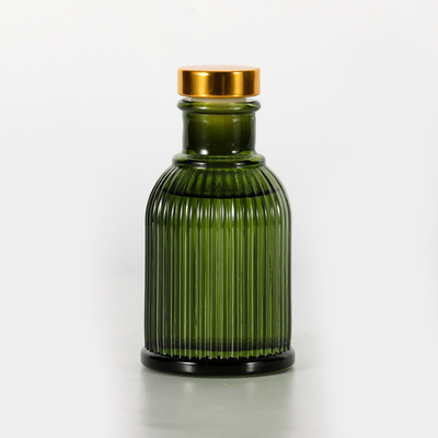 Etiqueta privada 100ml del difusor de caña de la botella de cristal de la fragancia del jardín con la tapa del metal del oro