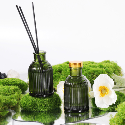 Etiqueta privada 100ml del difusor de caña de la botella de cristal de la fragancia del jardín con la tapa del metal del oro