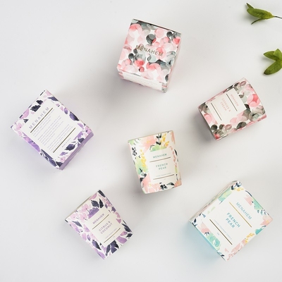 El regalo de lujo al por mayor del hogar del HOGAR del AROMA fijó la vela perfumada de la flor de la fragancia del vidrio del tarro de la cera creativa de encargo de la soja