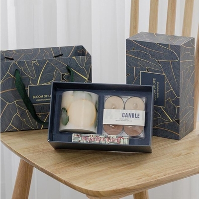 El regalo perfumado de la vela de la taza de la flor de la cera cilíndrica del té fijó colorido para el banquete de boda